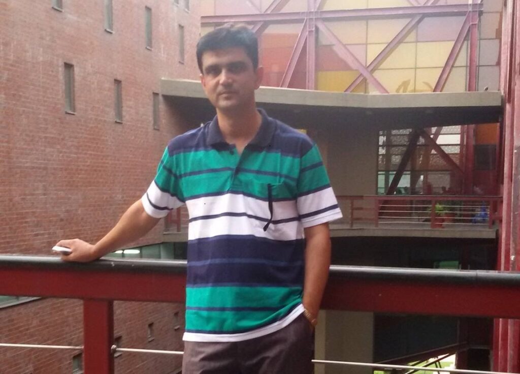 Professional headshot of Sanjay Kumar Jha