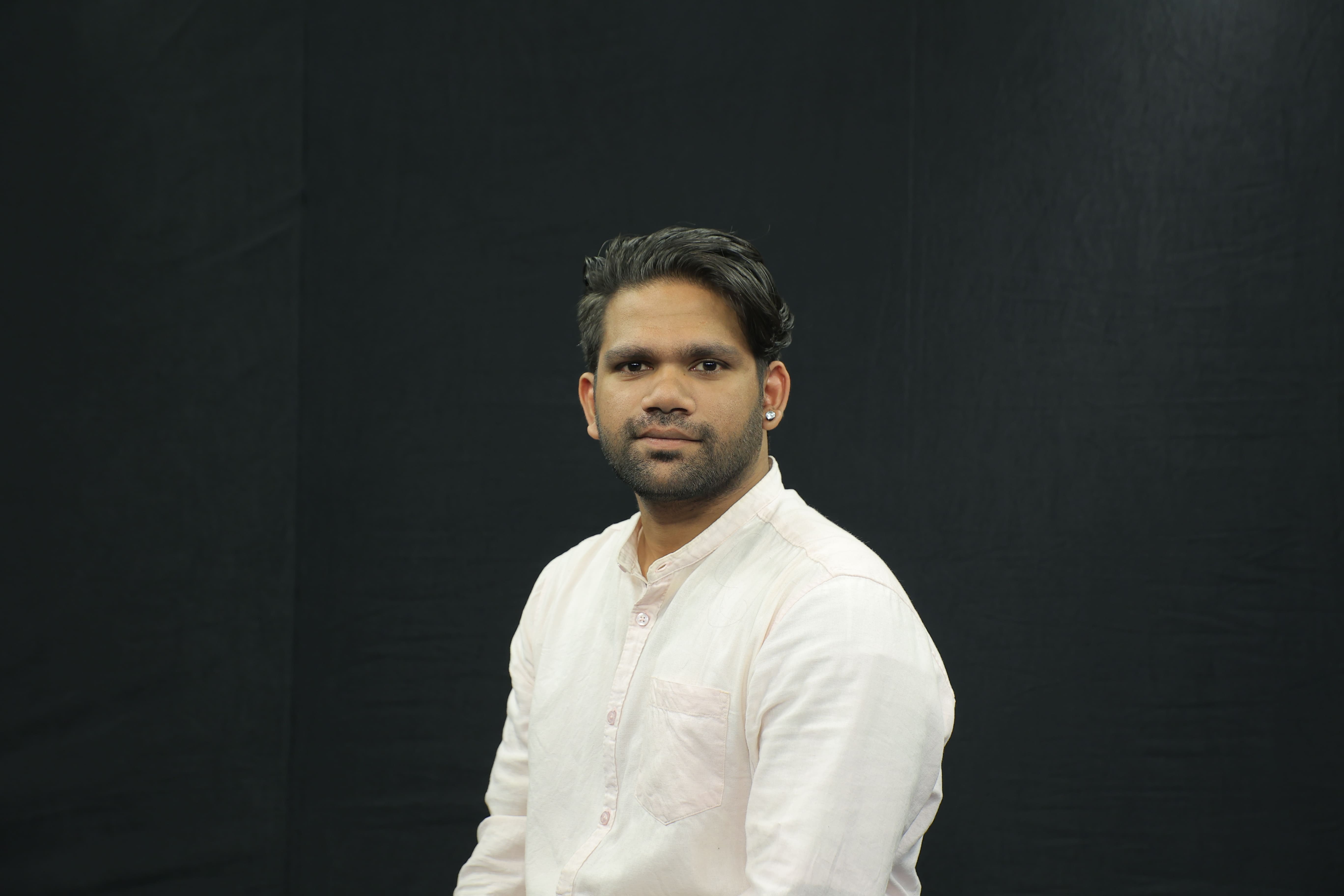 Professional Headshot of Arjun Dinesh K.